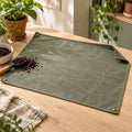 Fold-Flat Potting Mat with Brass Snaps — Lifestyle scene